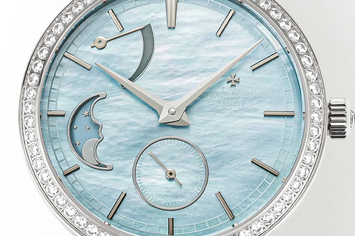 Traditionelle Moon Phase Blue MOP Dial with Diamond Bezel in White Gold on Blue Leather Strap